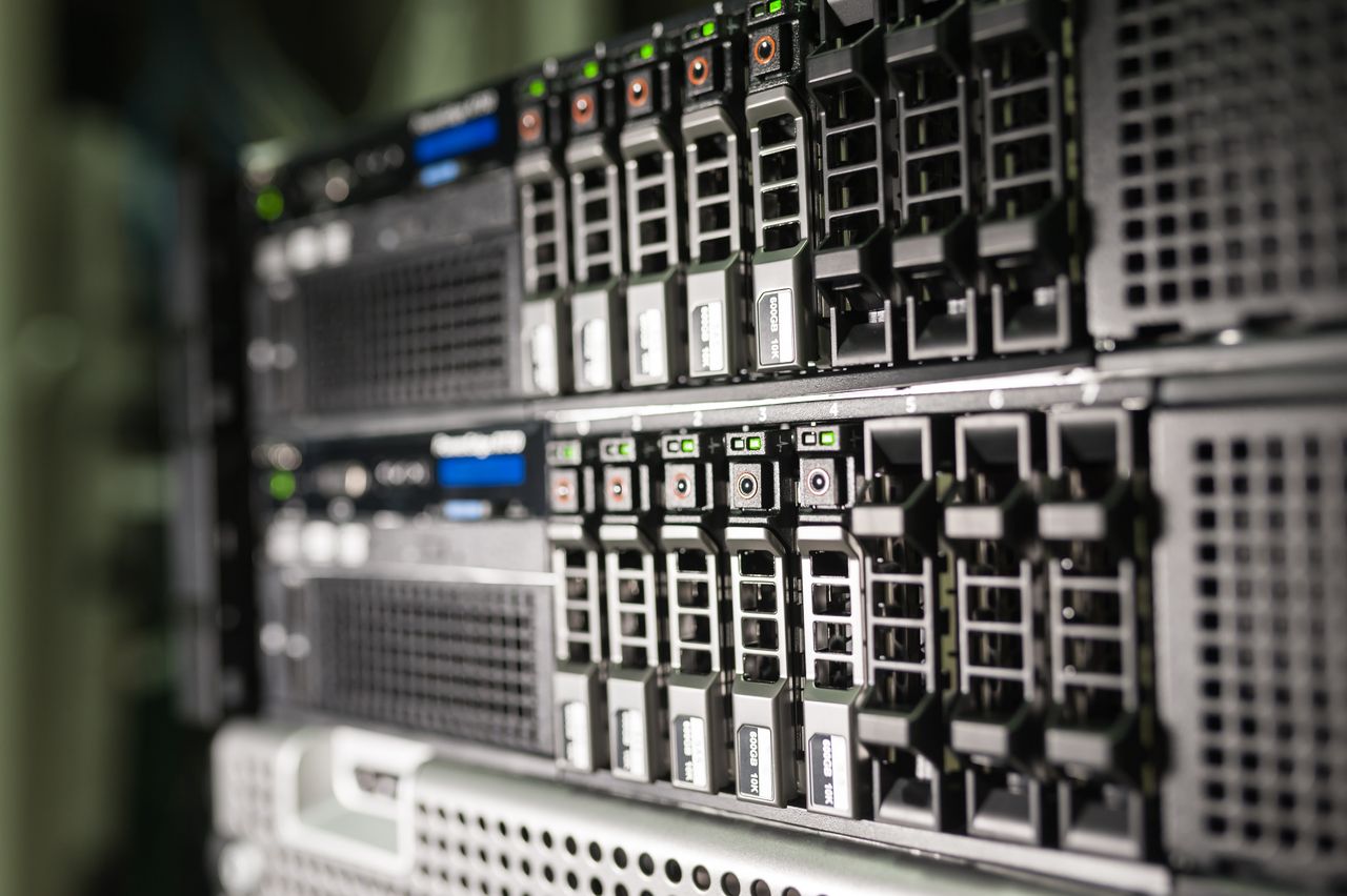 Services-03 Close-up of server equipment in a modern data center highlighting technology infrastructure.